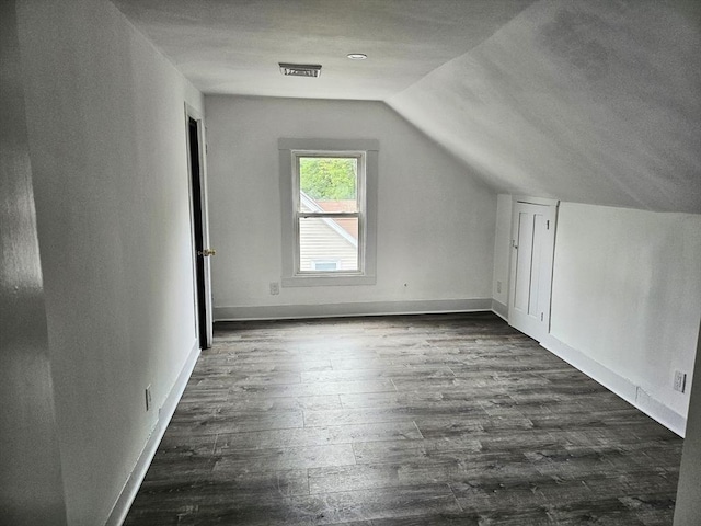 21 High St, South Hadley, MA 01075 - bonus room featuring vaulted ceiling and dark wood finished floors