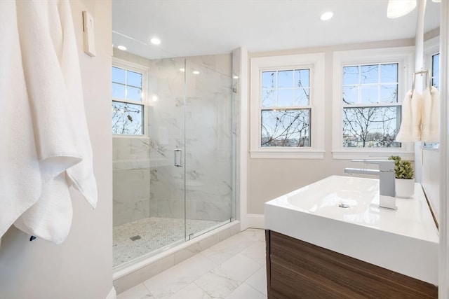 bathroom with vanity and an enclosed shower