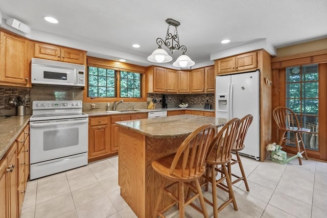 236 Ridge Ave, Otis, MA 01253 - kitchen with white appliances, a sink, light stone countertops, light tile patterned floors, and recessed lighting
