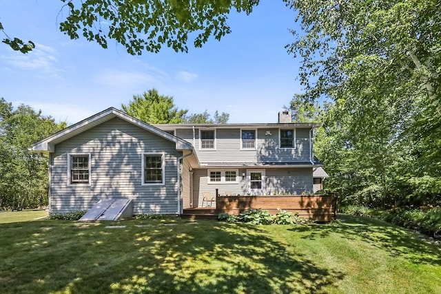 236 Ridge Ave, Otis, MA 01253 - back of house featuring a chimney, a wooden deck, and a lawn