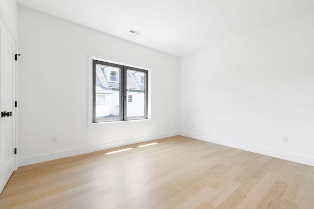 1597 Centre St Unit A, Newton, MA 02461 - unfurnished room featuring light wood-style flooring and baseboards