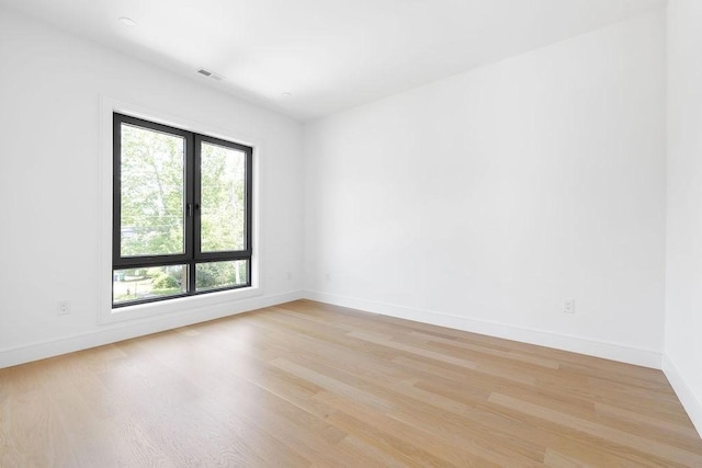 1597 Centre St Unit A, Newton, MA 02461 - empty room featuring light wood-style flooring