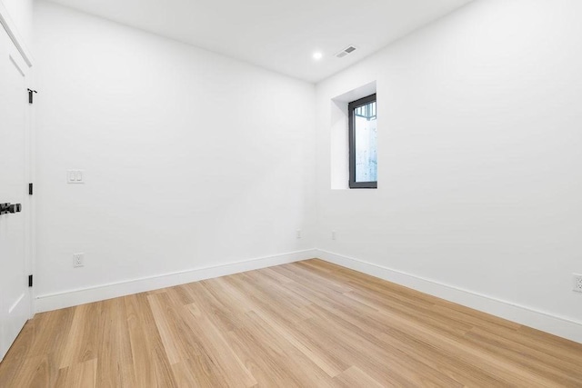 1597 Centre St Unit A, Newton, MA 02461 - unfurnished room featuring light wood-style flooring and recessed lighting
