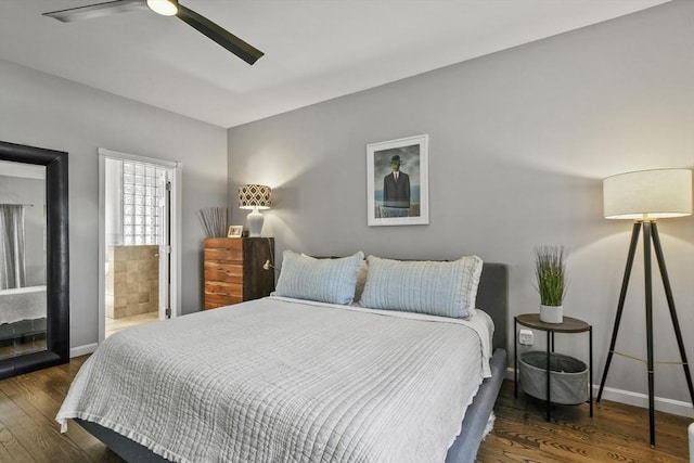 bedroom with a ceiling fan, wood finished floors, baseboards, and ensuite bathroom