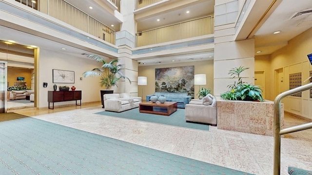 99 Pond Ave Unit 326, Brookline, MA 02445 - community lobby with a high ceiling and recessed lighting