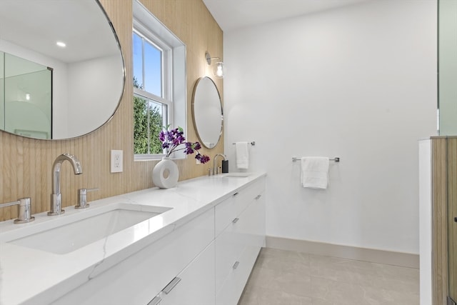 bathroom with vanity and tile patterned floors