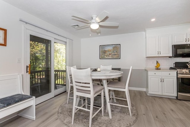 62 Maple St Unit J, Canton, MA 02021 - dining room featuring light wood-style flooring, wainscoting, a ceiling fan, and recessed lighting