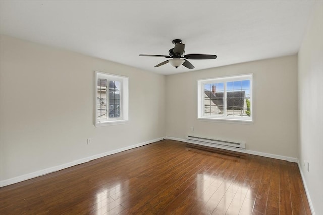 21 Central Ave Unit 30, Everett, MA 02149 - unfurnished room featuring baseboard heating, wood-type flooring, and ceiling fan