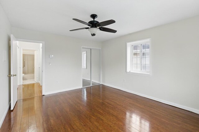 21 Central Ave Unit 30, Everett, MA 02149 - unfurnished bedroom featuring hardwood / wood-style floors, a closet, and a ceiling fan