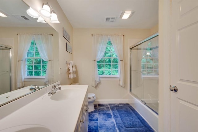 43 Old Concord Rd, Lincoln, MA 01773 - bathroom featuring toilet, plenty of natural light, vanity, and baseboards