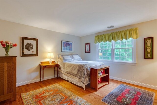 43 Old Concord Rd, Lincoln, MA 01773 - bedroom with light wood-type flooring and baseboards