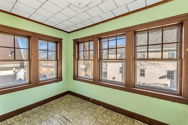 unfurnished sunroom featuring a wealth of natural light