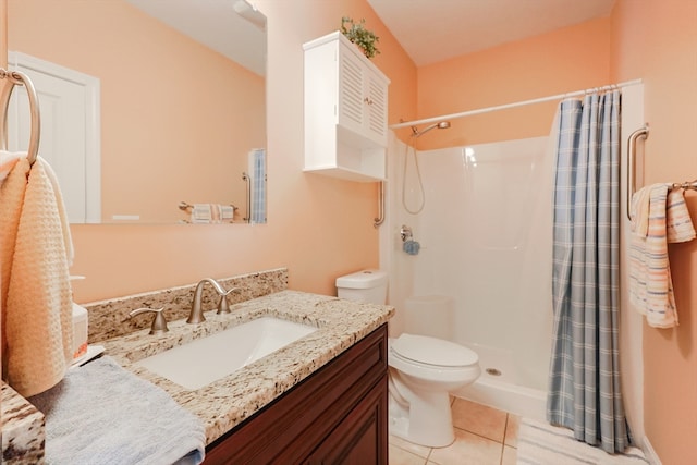 bathroom with vanity, toilet, a shower with curtain, and tile patterned flooring