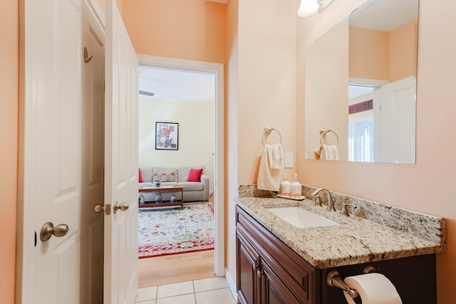 bathroom featuring vanity and hardwood / wood-style flooring