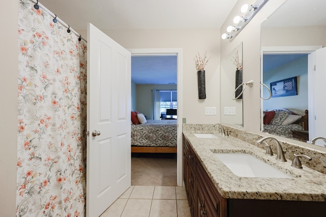 bathroom featuring vanity and tile patterned flooring