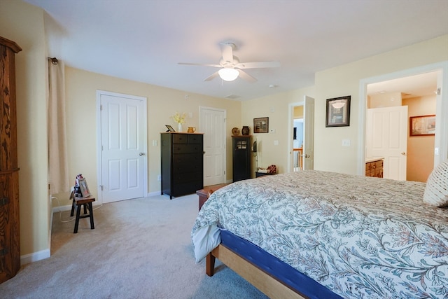 bedroom with light carpet and ceiling fan