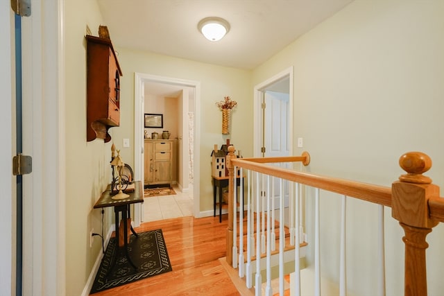 corridor featuring light hardwood / wood-style floors