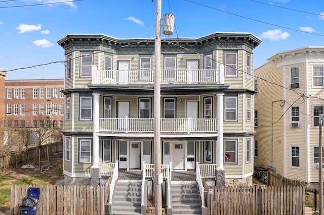 view of front facade with a balcony