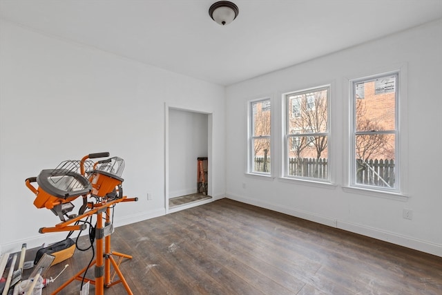 unfurnished room featuring dark hardwood / wood-style floors