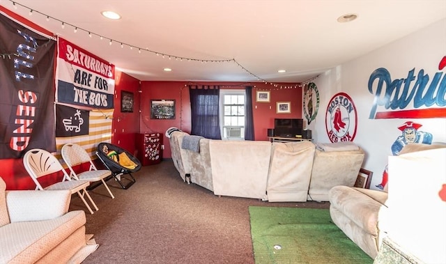 living area featuring carpet and recessed lighting