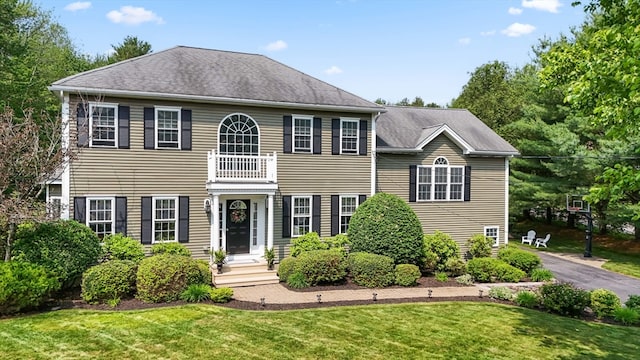 356 Grafton St, Shrewsbury, MA 01545 - view of front facade with a front lawn and a balcony