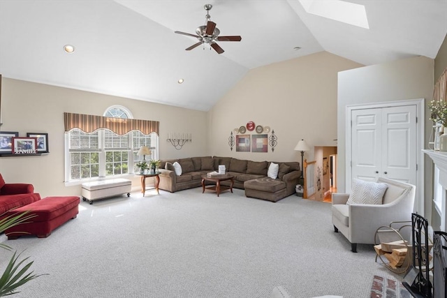 356 Grafton St, Shrewsbury, MA 01545 - living room featuring carpet floors, vaulted ceiling, ceiling fan, and a skylight