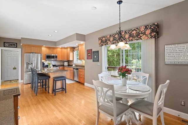 356 Grafton St, Shrewsbury, MA 01545 - dining room with a chandelier, healthy amount of natural light, light wood-type flooring, and recessed lighting