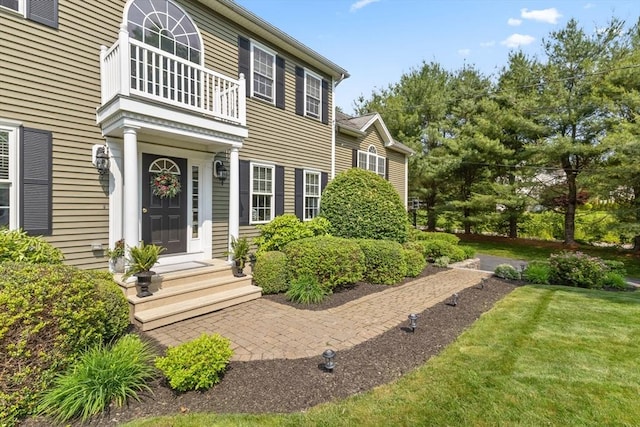 356 Grafton St, Shrewsbury, MA 01545 - doorway to property featuring a balcony and a yard