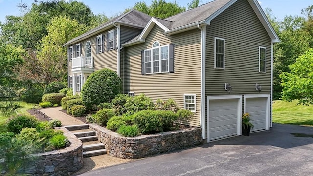 356 Grafton St, Shrewsbury, MA 01545 - view of side of home featuring driveway and a garage