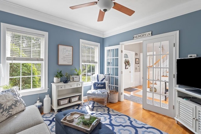 356 Grafton St, Shrewsbury, MA 01545 - living room featuring crown molding, wood finished floors, and a ceiling fan