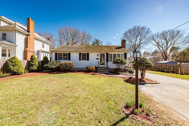 32 Hampden Ave, Brockton, MA 02301 - view of front of house with a chimney and driveway