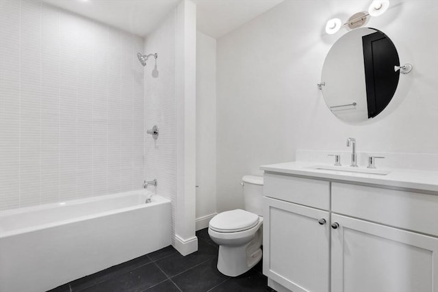 full bathroom featuring tile patterned flooring, vanity, toilet, and tiled shower / bath