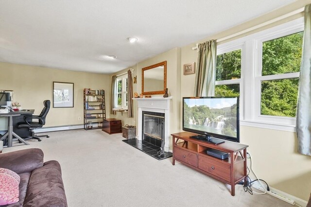 34 S Riverview St, Haverhill, MA 01835 - carpeted living room with plenty of natural light, a glass covered fireplace, baseboards, and an office area