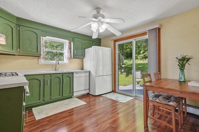 34 S Riverview St, Haverhill, MA 01835 - kitchen with green cabinetry, white appliances, a sink, light countertops, and a textured ceiling