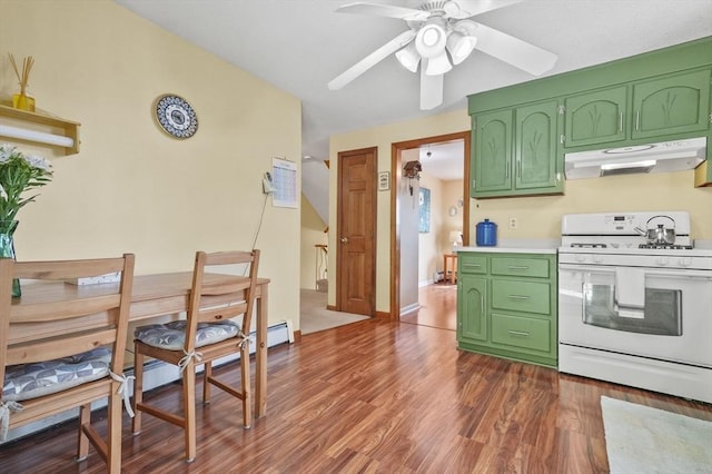 34 S Riverview St, Haverhill, MA 01835 - kitchen with white gas stove, under cabinet range hood, green cabinets, dark wood-type flooring, and a ceiling fan