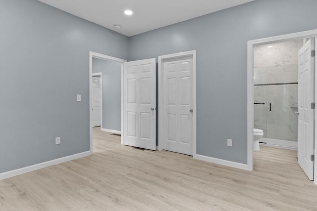 67 Elliott Ave, Dracut, MA 01826 - unfurnished bedroom featuring light wood finished floors and connected bathroom