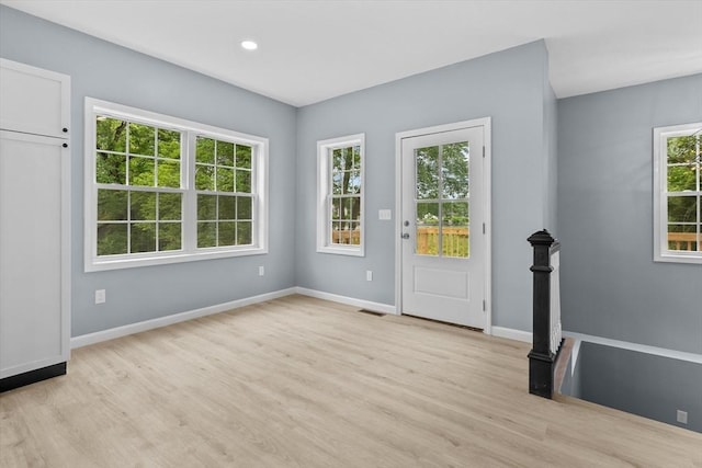 67 Elliott Ave, Dracut, MA 01826 - entryway featuring light wood-type flooring and recessed lighting