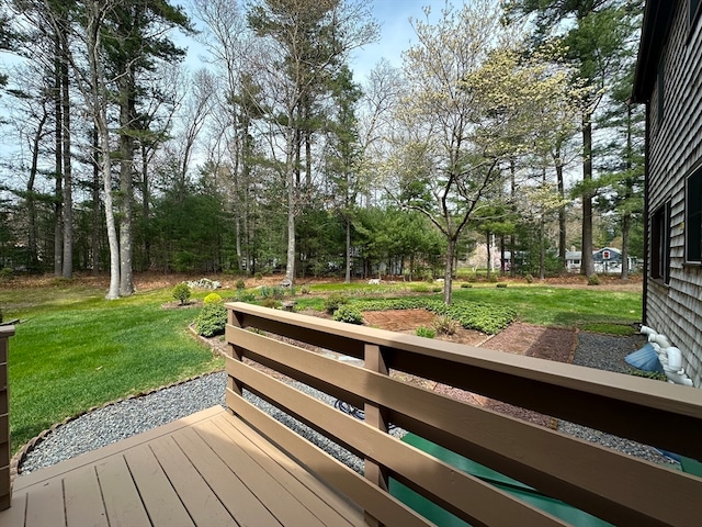 deck featuring a yard