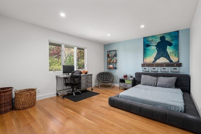 bedroom with wood finished floors, a desk, recessed lighting, and baseboards
