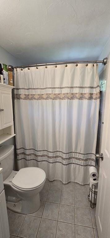 46 Beach Rd Unit B, Yarmouth, MA 02673 - full bath featuring tile patterned floors, vanity, and a shower with shower curtain