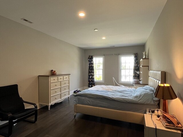 bedroom featuring dark wood-style flooring, recessed lighting, and baseboards