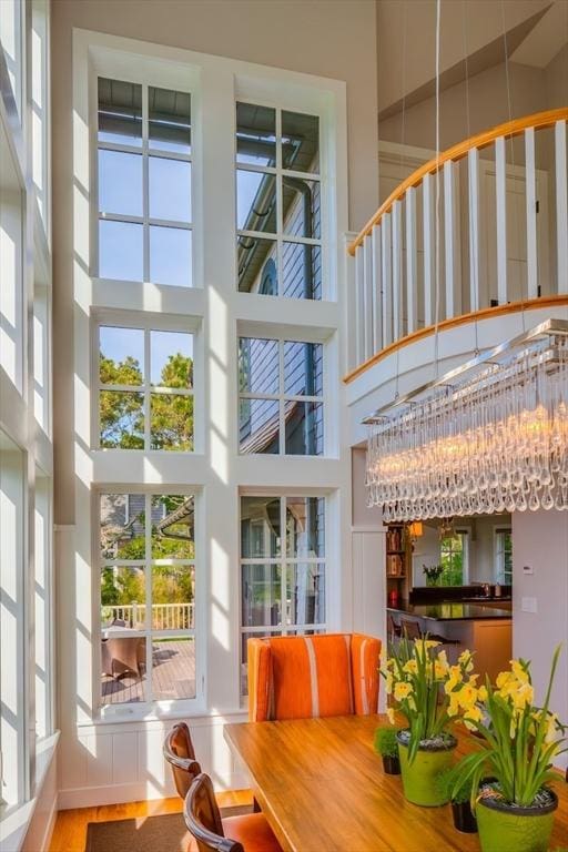 unfurnished sunroom featuring a chandelier