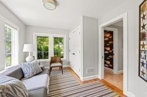 sitting room with light wood-type flooring