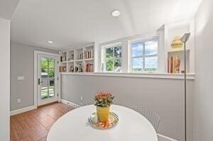 dining area with wood-type flooring