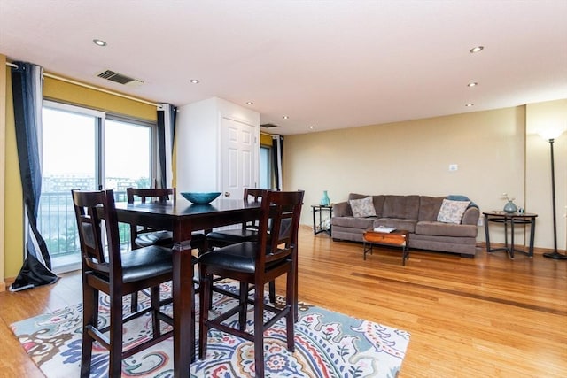 154 Lynnway Unit 511, Lynn, MA 01902 - dining space with light wood finished floors and recessed lighting
