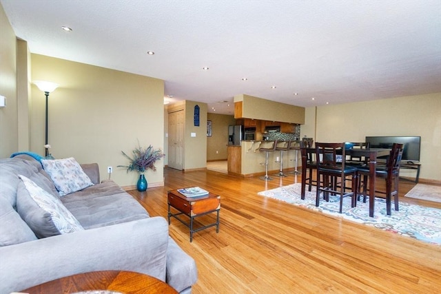 154 Lynnway Unit 511, Lynn, MA 01902 - living room with light wood-style floors and recessed lighting