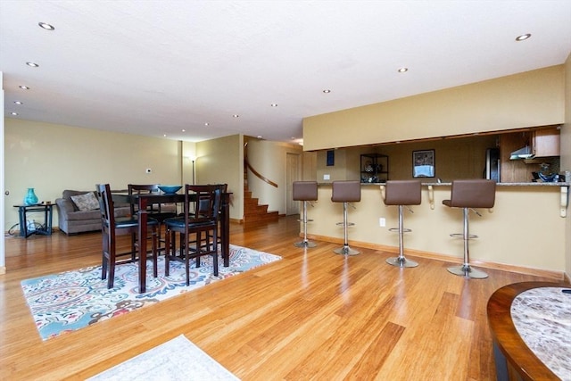 154 Lynnway Unit 511, Lynn, MA 01902 - dining area with wood finished floors, stairway, and recessed lighting