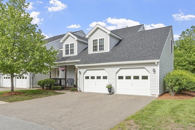 108 Green Briar Rd Unit 108, Fitchburg, MA 01420 - new england style home with asphalt driveway, covered porch, and roof with shingles