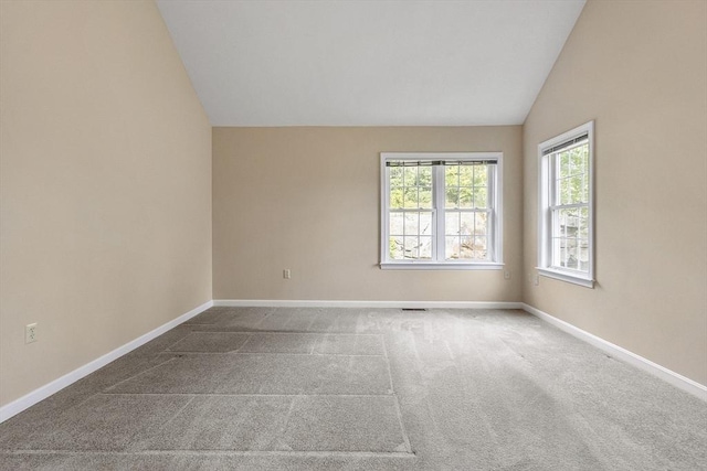 108 Green Briar Rd Unit 108, Fitchburg, MA 01420 - carpeted empty room featuring vaulted ceiling and baseboards