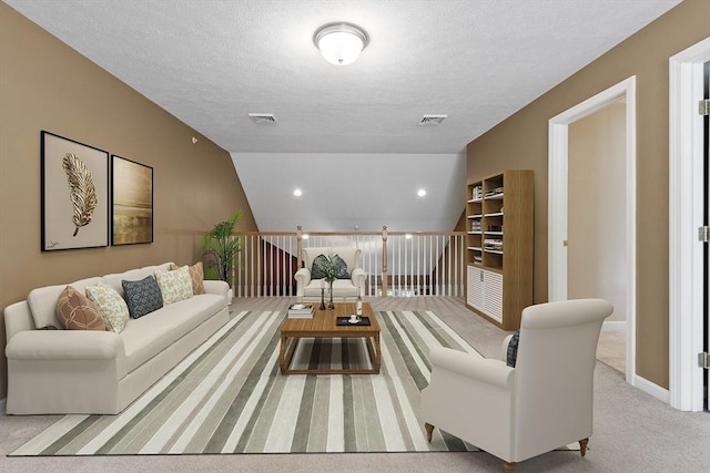 108 Green Briar Rd Unit 108, Fitchburg, MA 01420 - living area with carpet flooring and a textured ceiling